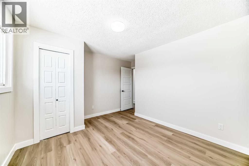 6128 Madigan Drive Ne, Calgary, AB - Indoor Photo Showing Other Room