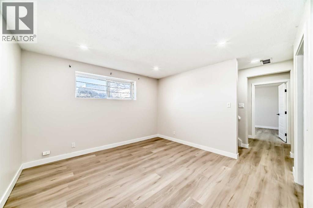 6128 Madigan Drive Ne, Calgary, AB - Indoor Photo Showing Other Room