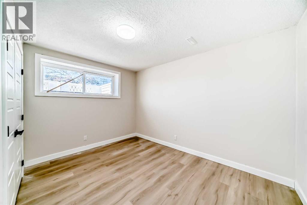 6128 Madigan Drive Ne, Calgary, AB - Indoor Photo Showing Other Room