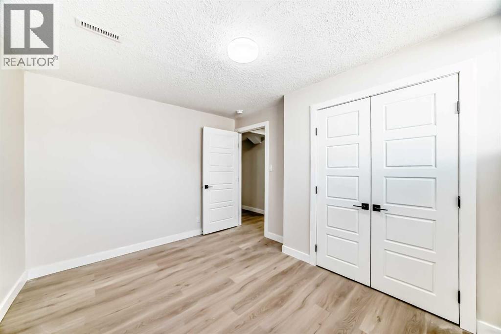 6128 Madigan Drive Ne, Calgary, AB - Indoor Photo Showing Other Room