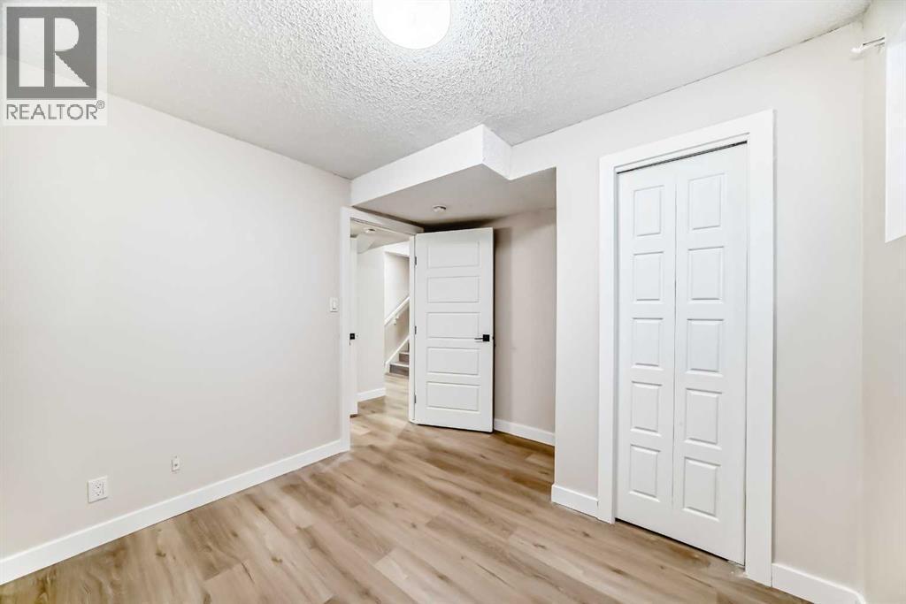 6128 Madigan Drive Ne, Calgary, AB - Indoor Photo Showing Other Room