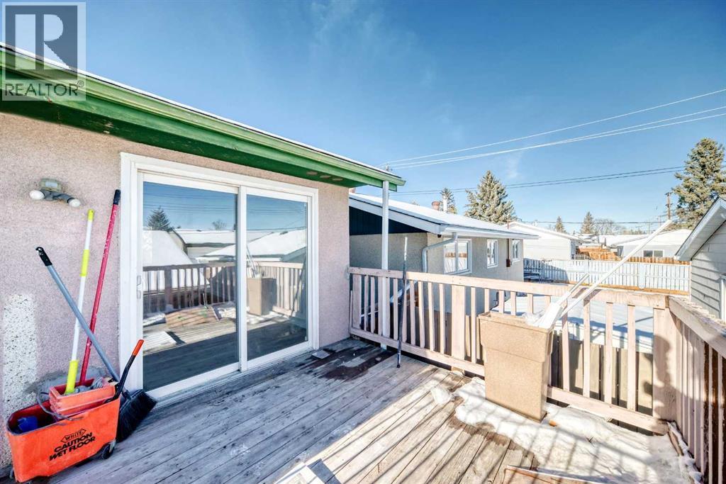 6128 Madigan Drive Ne, Calgary, AB - Outdoor With Deck Patio Veranda With Exterior
