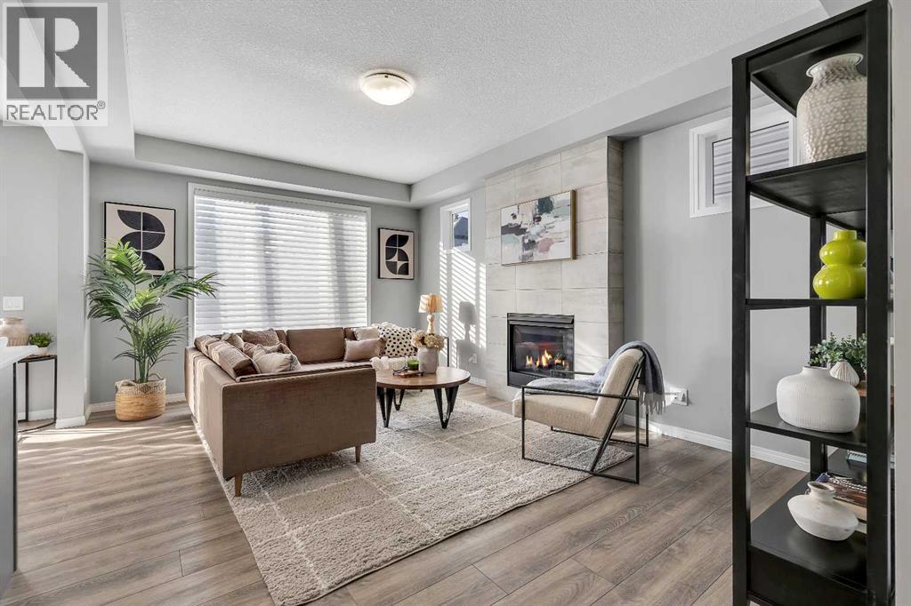 138 Cityside Way Ne, Calgary, AB - Indoor Photo Showing Living Room With Fireplace