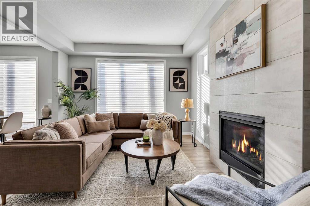 138 Cityside Way Ne, Calgary, AB - Indoor Photo Showing Living Room With Fireplace