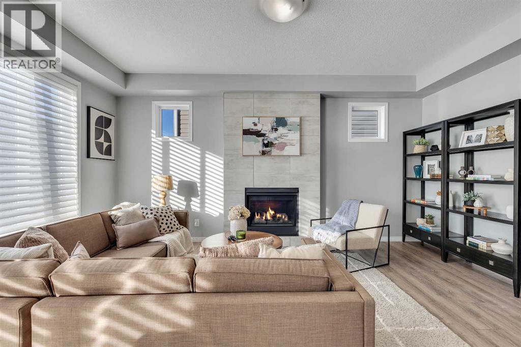 138 Cityside Way Ne, Calgary, AB - Indoor Photo Showing Living Room With Fireplace