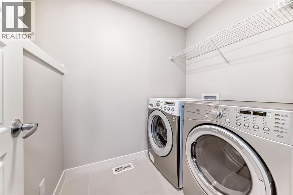 267 Sage Bluff Rise Nw, Calgary, AB - Indoor Photo Showing Laundry Room