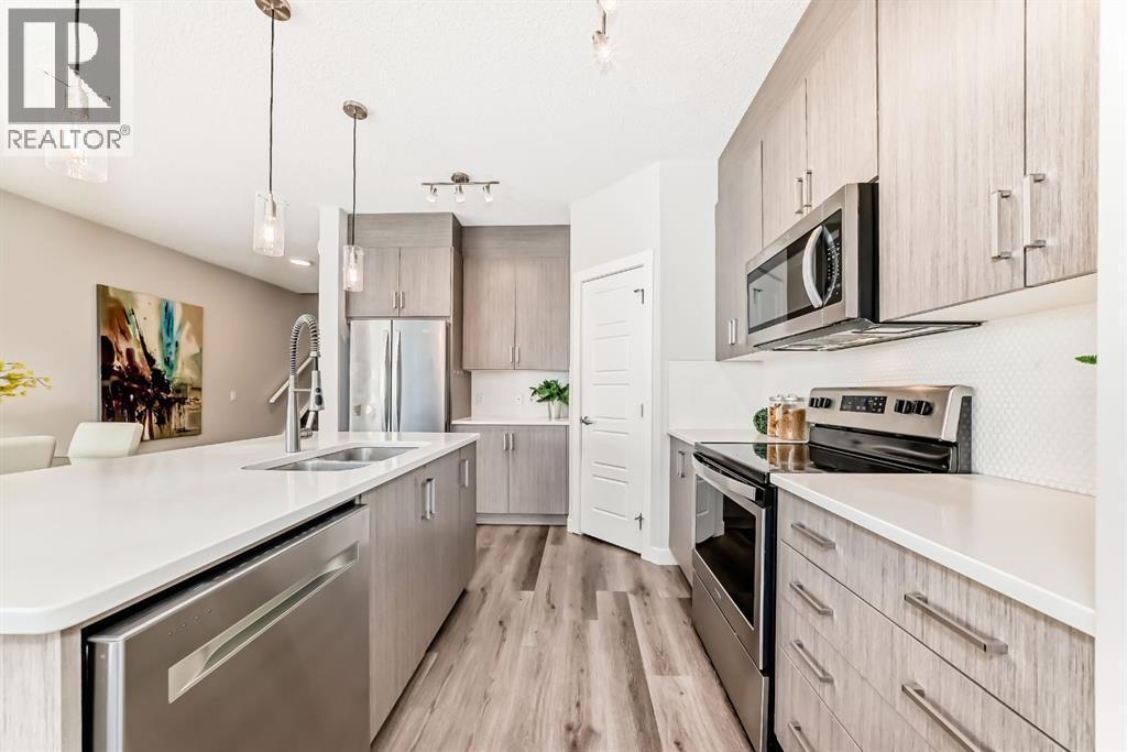 267 Sage Bluff Rise Nw, Calgary, AB - Indoor Photo Showing Kitchen With Double Sink With Upgraded Kitchen