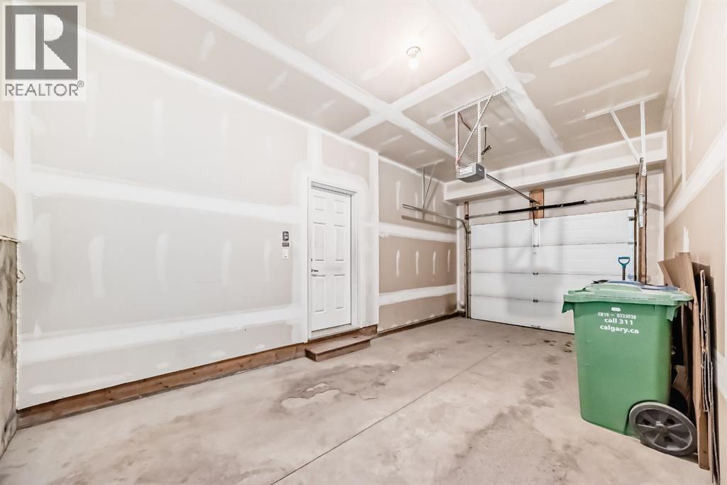267 Sage Bluff Rise Nw, Calgary, AB - Indoor Photo Showing Garage