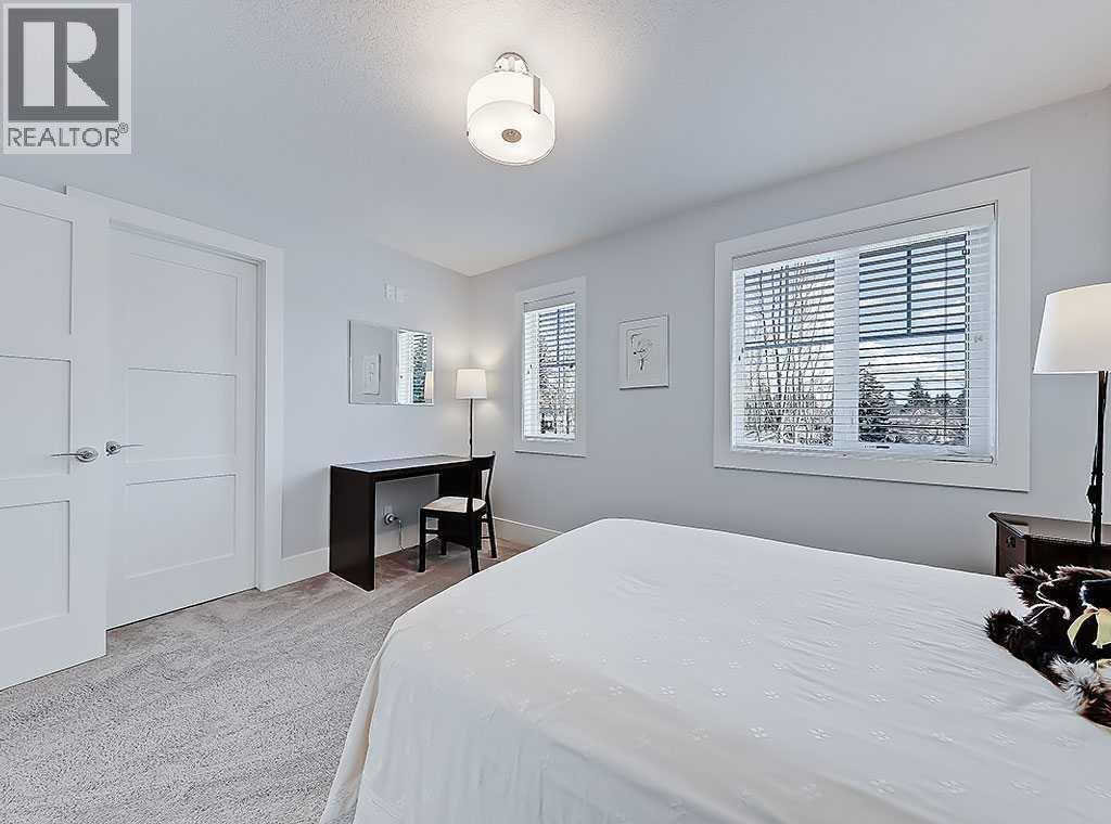 14 Rosetree Road Nw, Calgary, AB - Indoor Photo Showing Bedroom