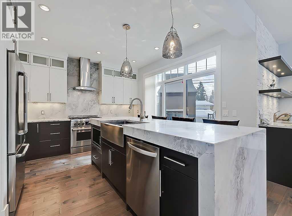 14 Rosetree Road Nw, Calgary, AB - Indoor Photo Showing Kitchen With Stainless Steel Kitchen With Upgraded Kitchen