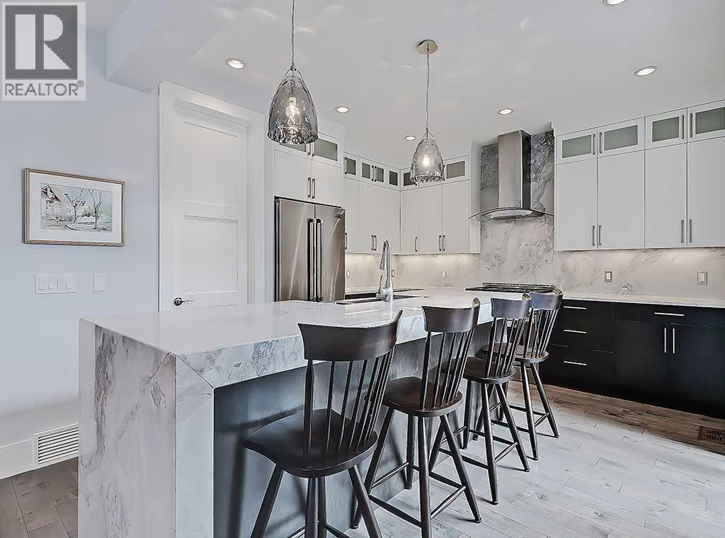 14 Rosetree Road Nw, Calgary, AB - Indoor Photo Showing Kitchen With Upgraded Kitchen