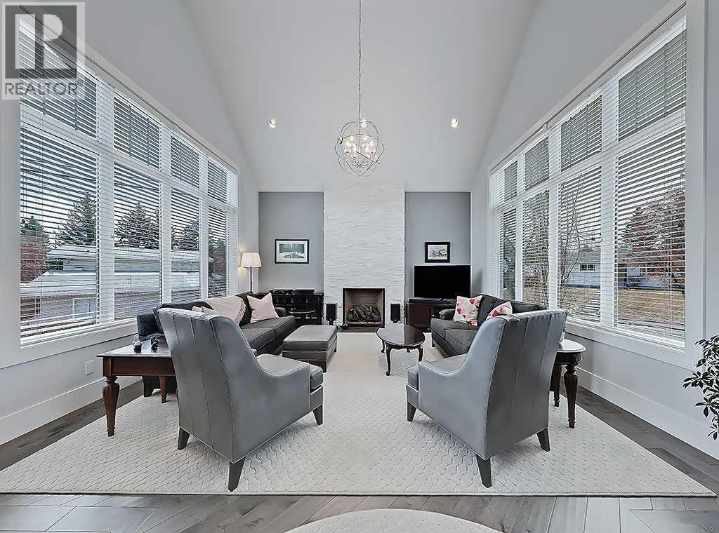 14 Rosetree Road Nw, Calgary, AB - Indoor With Fireplace