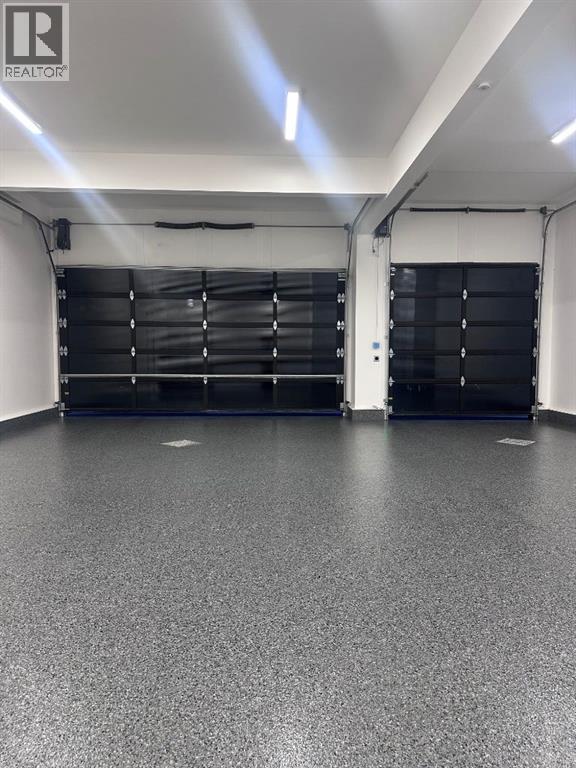 158 Jarvis Bay Drive, Jarvis Bay, AB - Indoor Photo Showing Garage