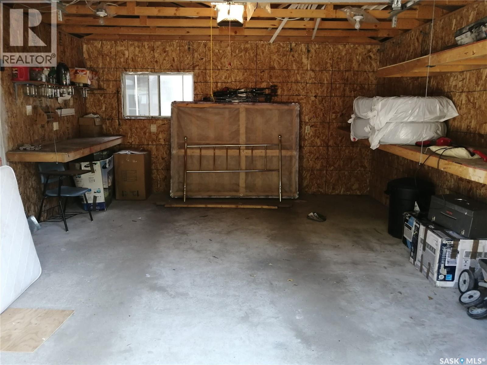 144 2Nd Street W, Ponteix, SK - Indoor Photo Showing Garage