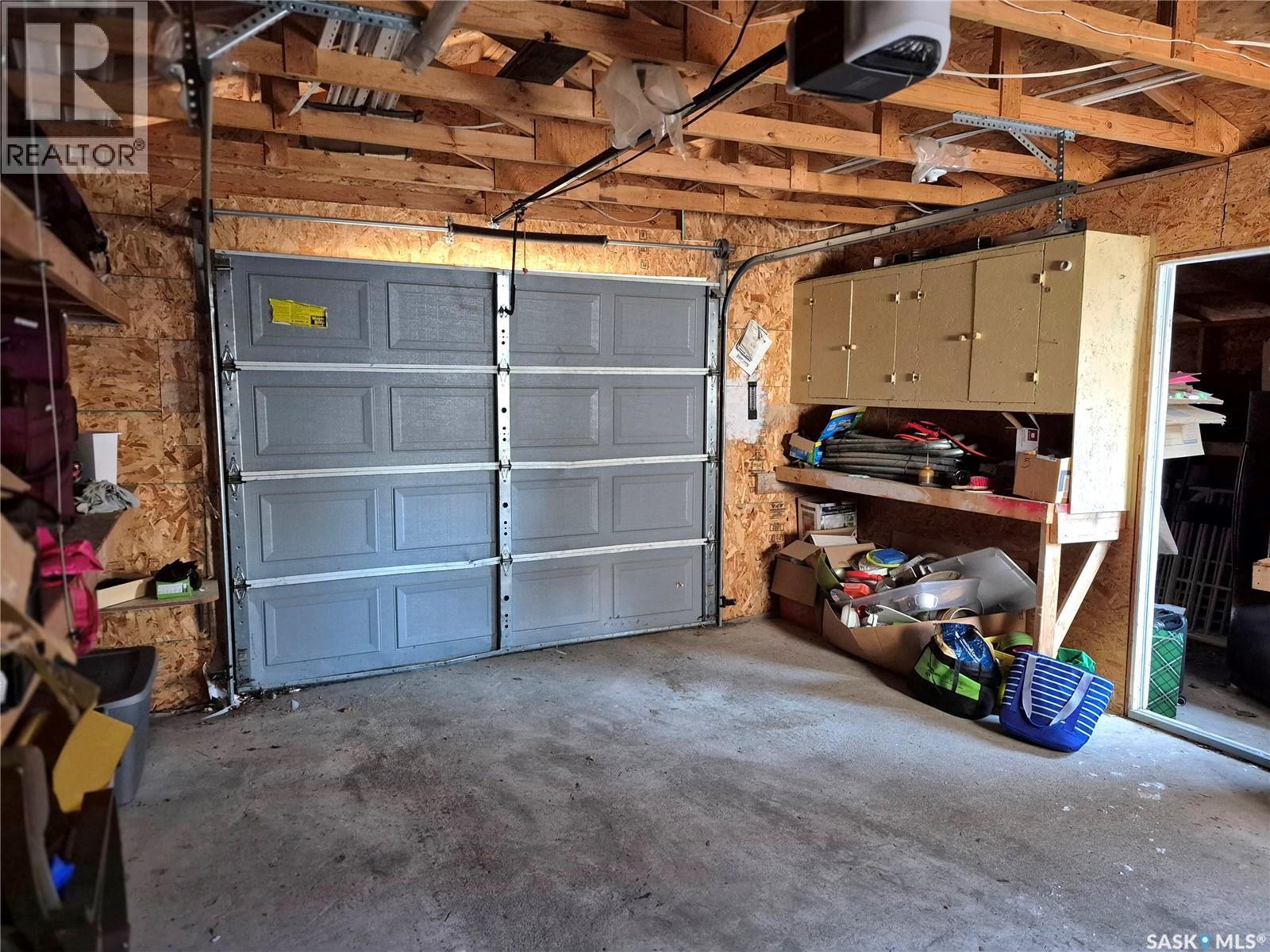144 2Nd Street W, Ponteix, SK - Indoor Photo Showing Garage