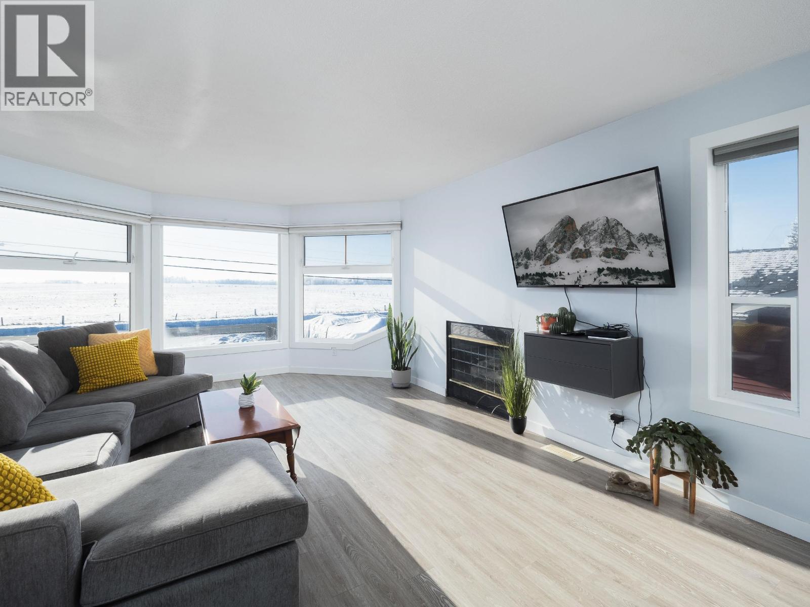 4622 Giscome Road, Prince George, BC - Indoor Photo Showing Living Room With Fireplace