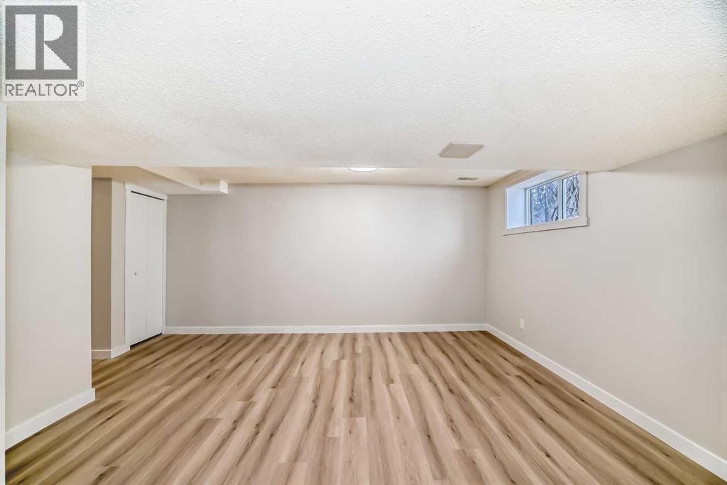 937 Marcombe Drive Ne, Calgary, AB - Indoor Photo Showing Other Room