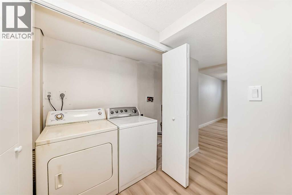 937 Marcombe Drive Ne, Calgary, AB - Indoor Photo Showing Laundry Room
