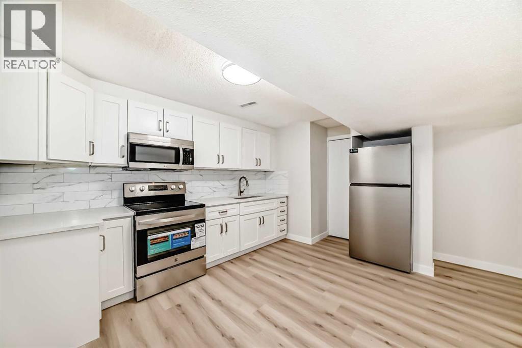 937 Marcombe Drive Ne, Calgary, AB - Indoor Photo Showing Kitchen