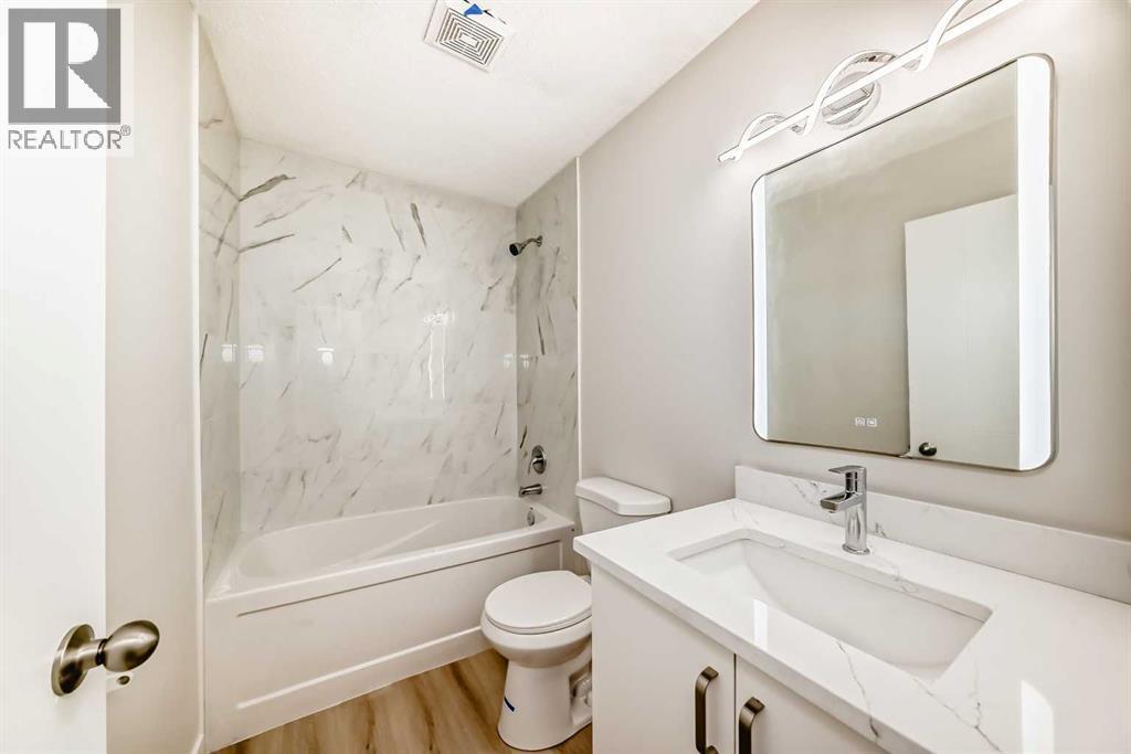 937 Marcombe Drive Ne, Calgary, AB - Indoor Photo Showing Bathroom