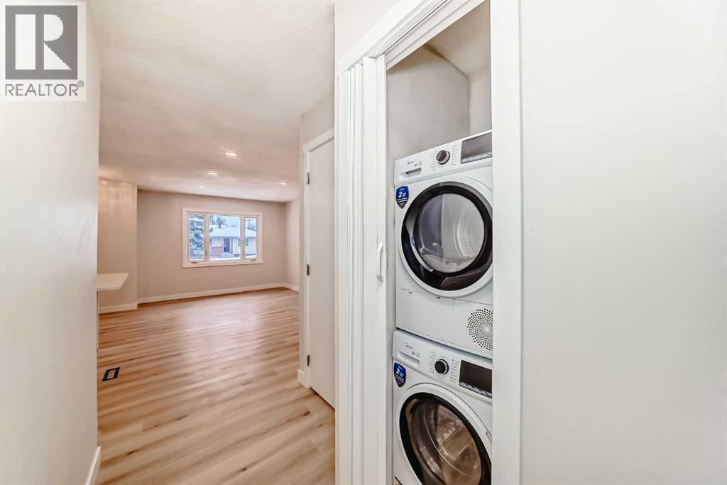 937 Marcombe Drive Ne, Calgary, AB - Indoor Photo Showing Laundry Room