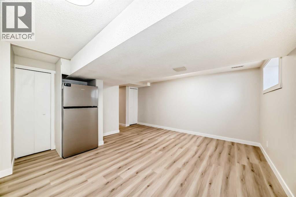 937 Marcombe Drive Ne, Calgary, AB - Indoor Photo Showing Other Room