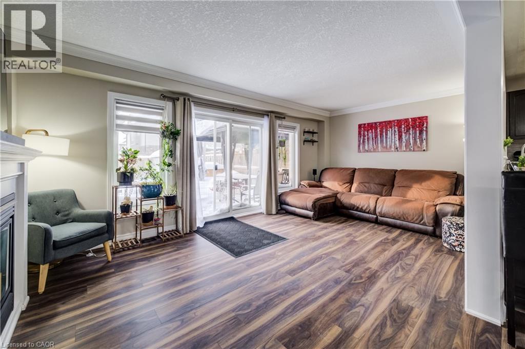 1444 Dunkirk Avenue, Woodstock, ON - Indoor Photo Showing Living Room With Fireplace