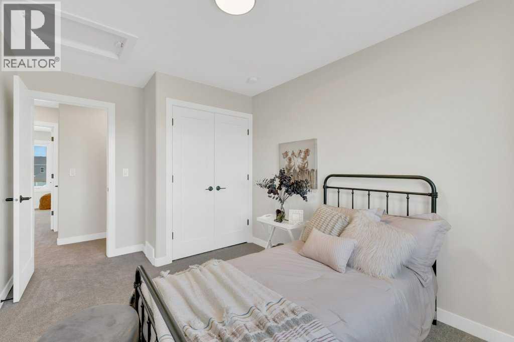 13 Gray Close, Sylvan Lake, AB - Indoor Photo Showing Bedroom