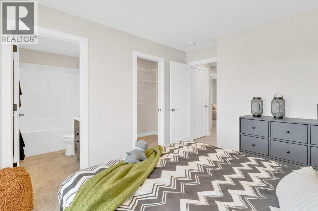 13 Gray Close, Sylvan Lake, AB - Indoor Photo Showing Bedroom