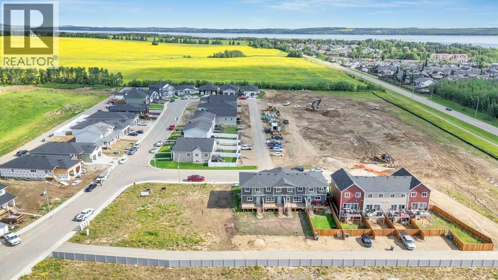 13 Gray Close, Sylvan Lake, AB - Outdoor With Body Of Water With View