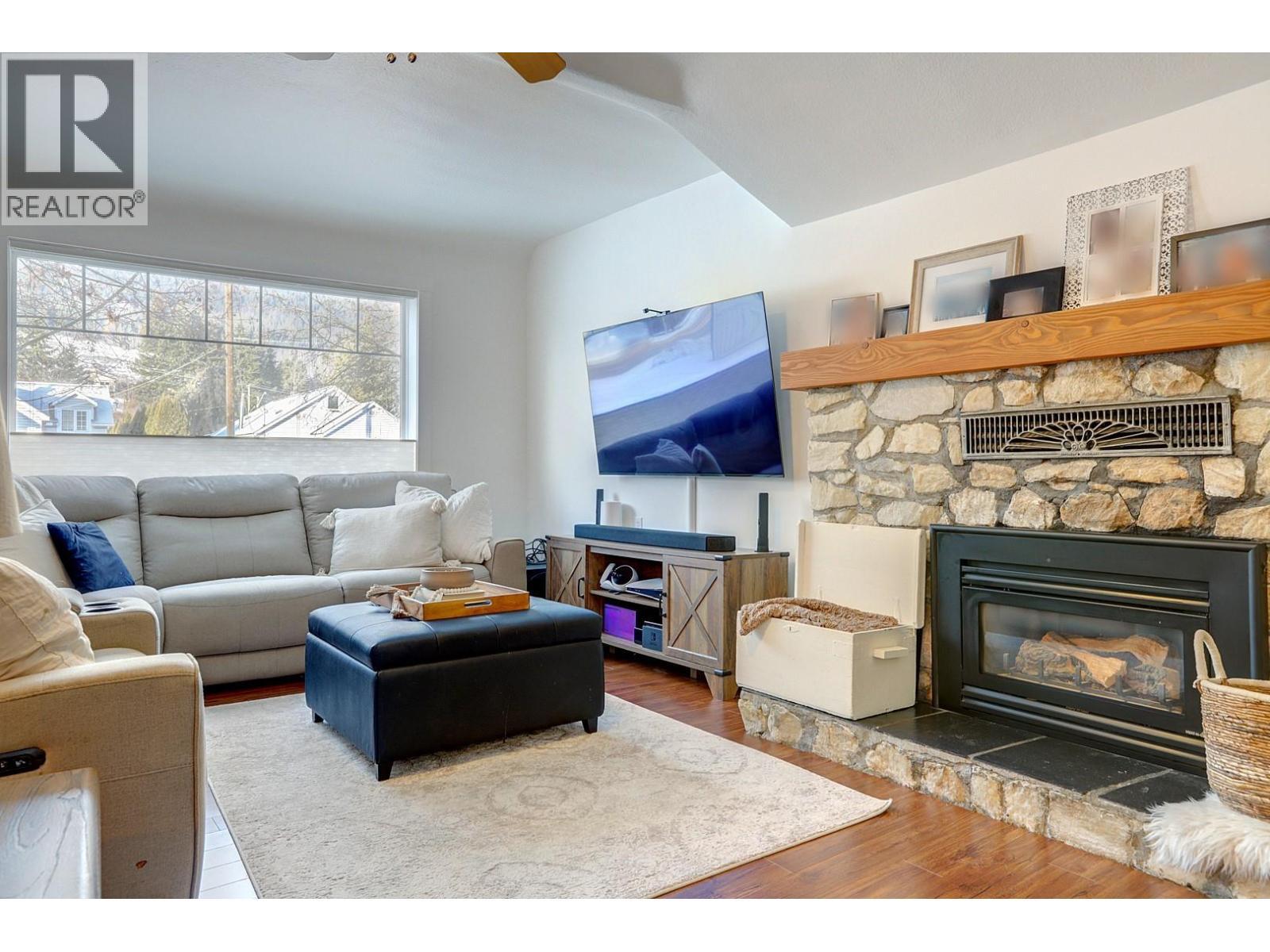 2245 Shuswap Avenue, Lumby, BC - Indoor Photo Showing Living Room With Fireplace