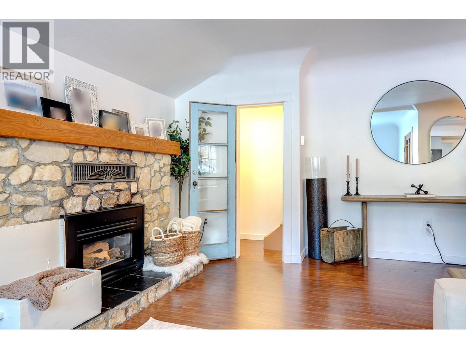 2245 Shuswap Avenue, Lumby, BC - Indoor Photo Showing Living Room With Fireplace