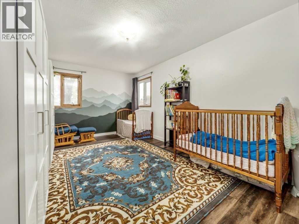 1026 7 Street N, Lethbridge, AB - Indoor Photo Showing Bedroom