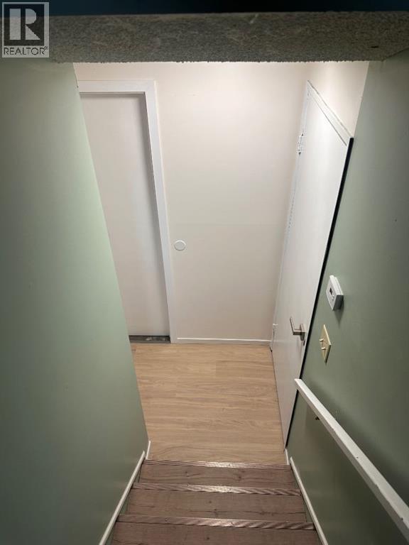 basement - 52 Wildrose Crescent, Brooks, AB - Indoor Photo Showing Other Room