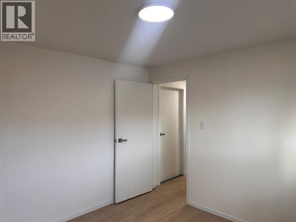 basement bedroom - 52 Wildrose Crescent, Brooks, AB - Indoor Photo Showing Other Room