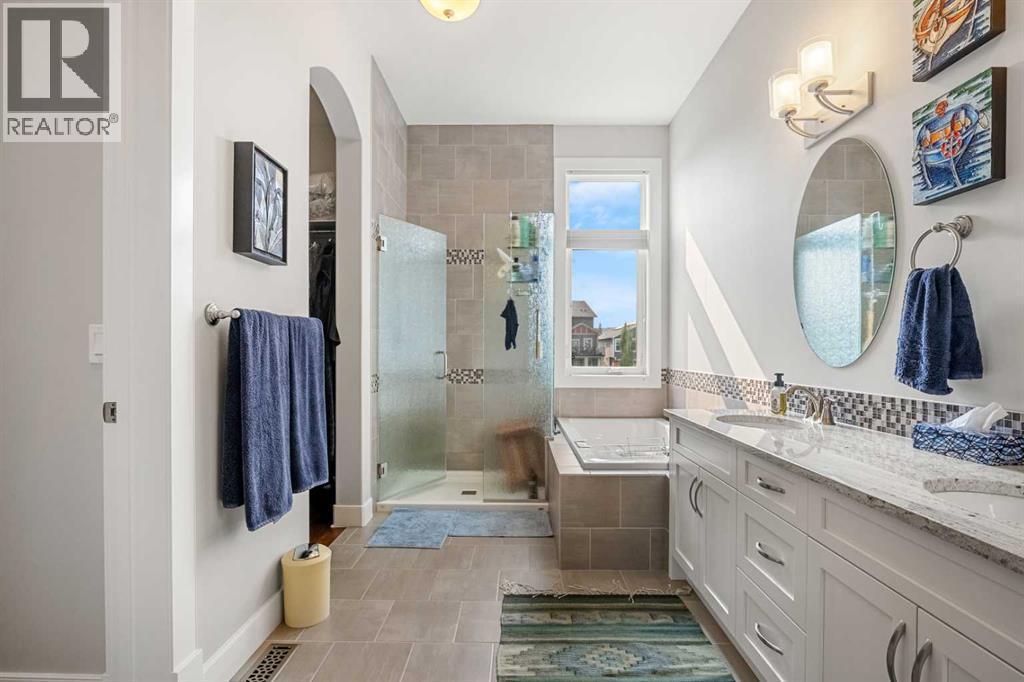 You will love the space like 5 piece ensuite with double sinks and a large soaker tub - 2253 Bayside Road Sw, Airdrie, AB - Indoor Photo Showing Bathroom
