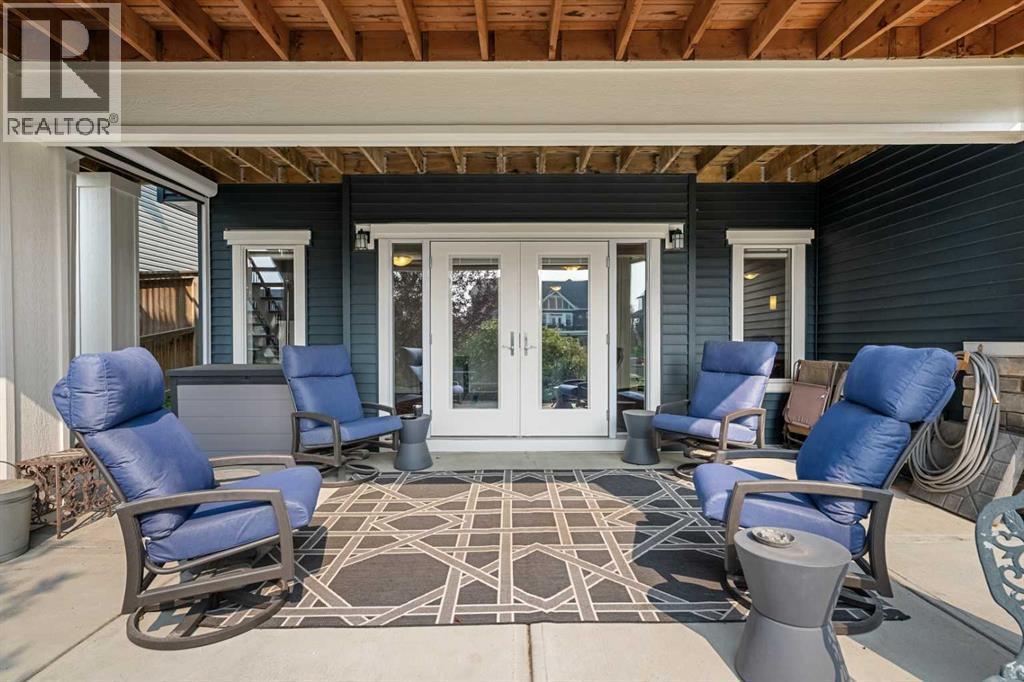 Walk-out into your private, landscaped yard - 2253 Bayside Road Sw, Airdrie, AB - Outdoor With Deck Patio Veranda With Exterior