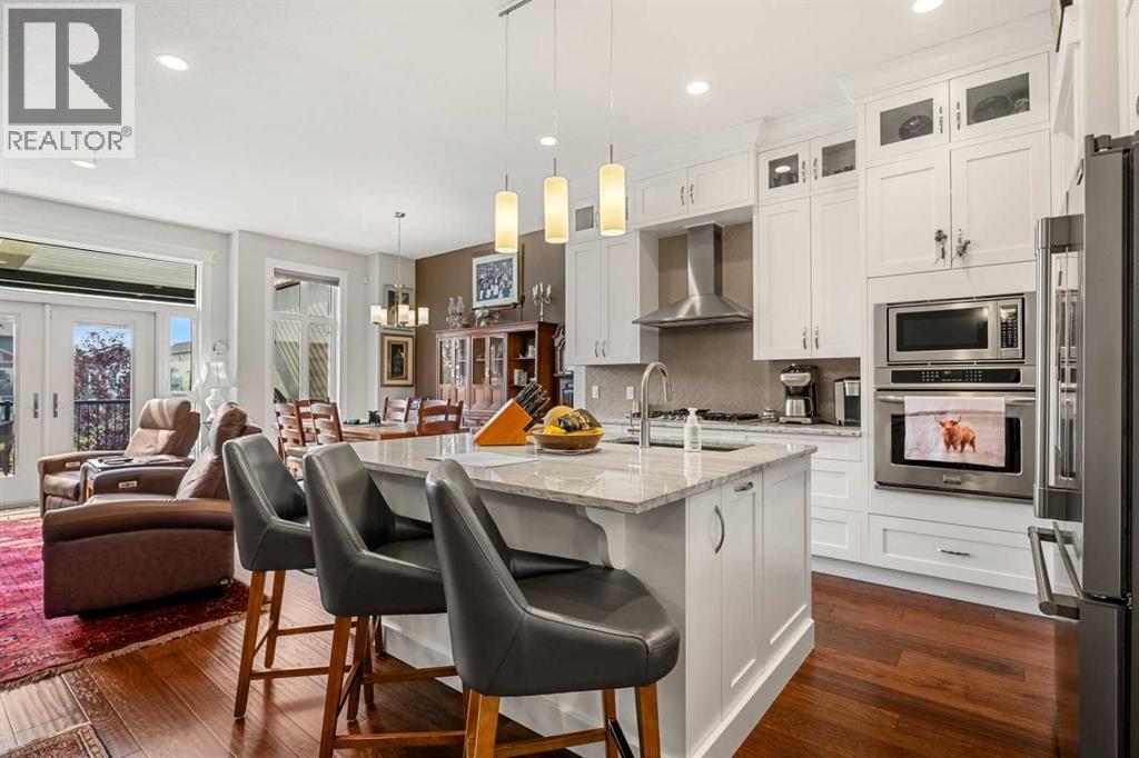 You will love the large island, ideal for entertaining - 2253 Bayside Road Sw, Airdrie, AB - Indoor Photo Showing Other Room