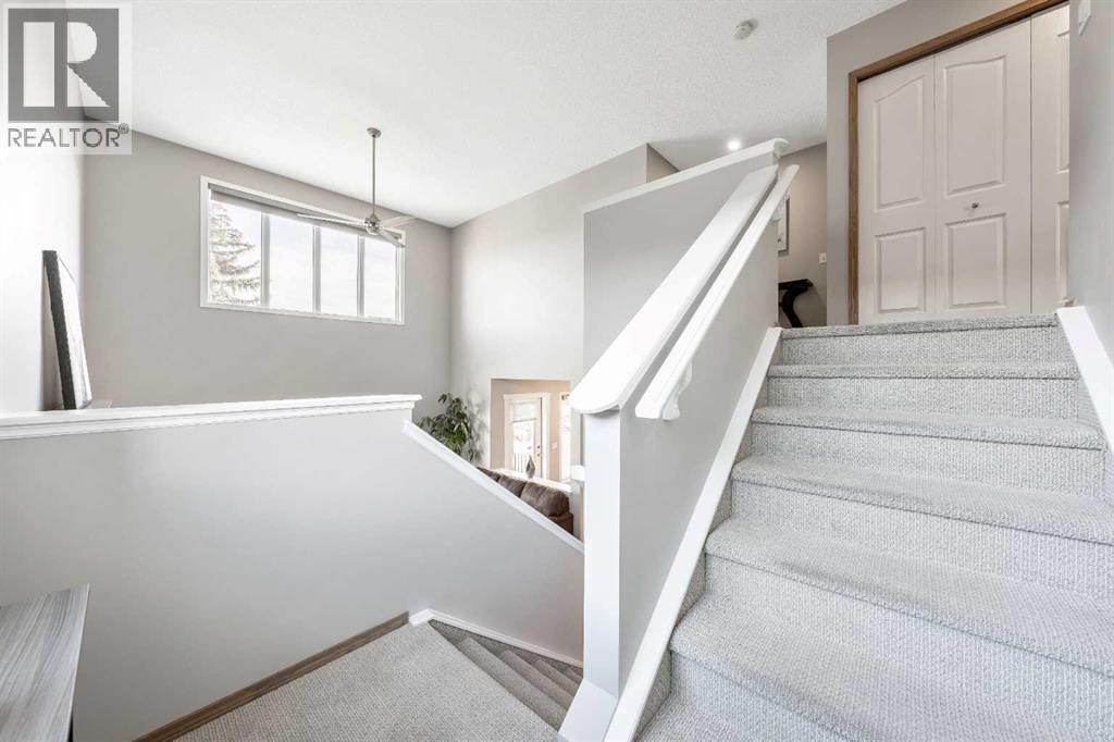 Stair Case to 2nd Level - 9 Hidden Valley Crescent Nw, Calgary, AB - Indoor Photo Showing Other Room