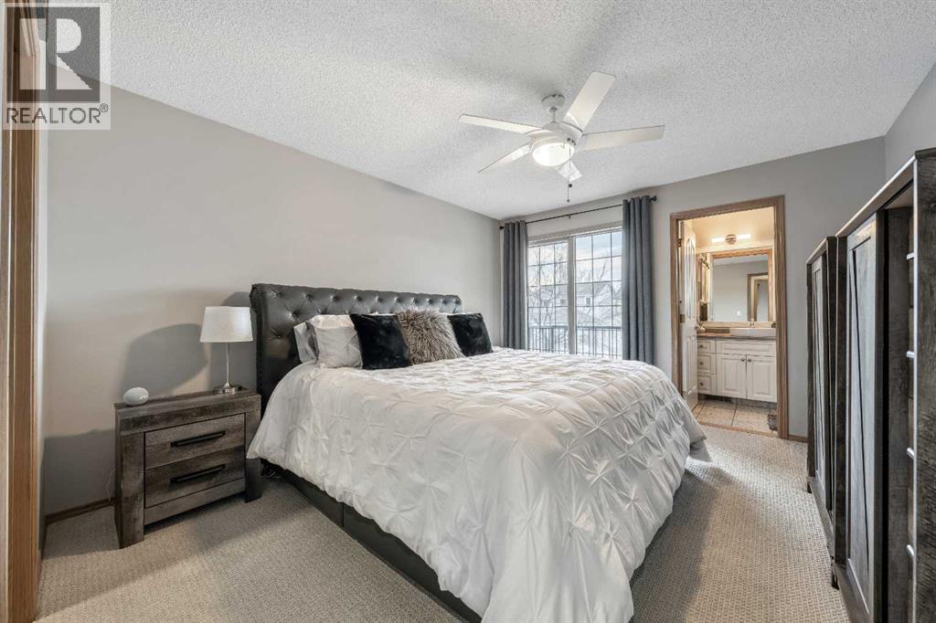 Primary Bedroom - 9 Hidden Valley Crescent Nw, Calgary, AB - Indoor Photo Showing Bedroom