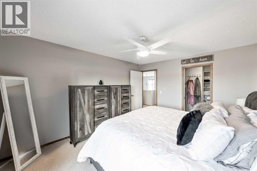 9 Hidden Valley Crescent Nw, Calgary, AB - Indoor Photo Showing Bedroom
