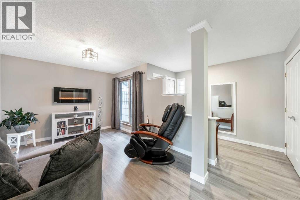 Den - 9 Hidden Valley Crescent Nw, Calgary, AB - Indoor Photo Showing Living Room