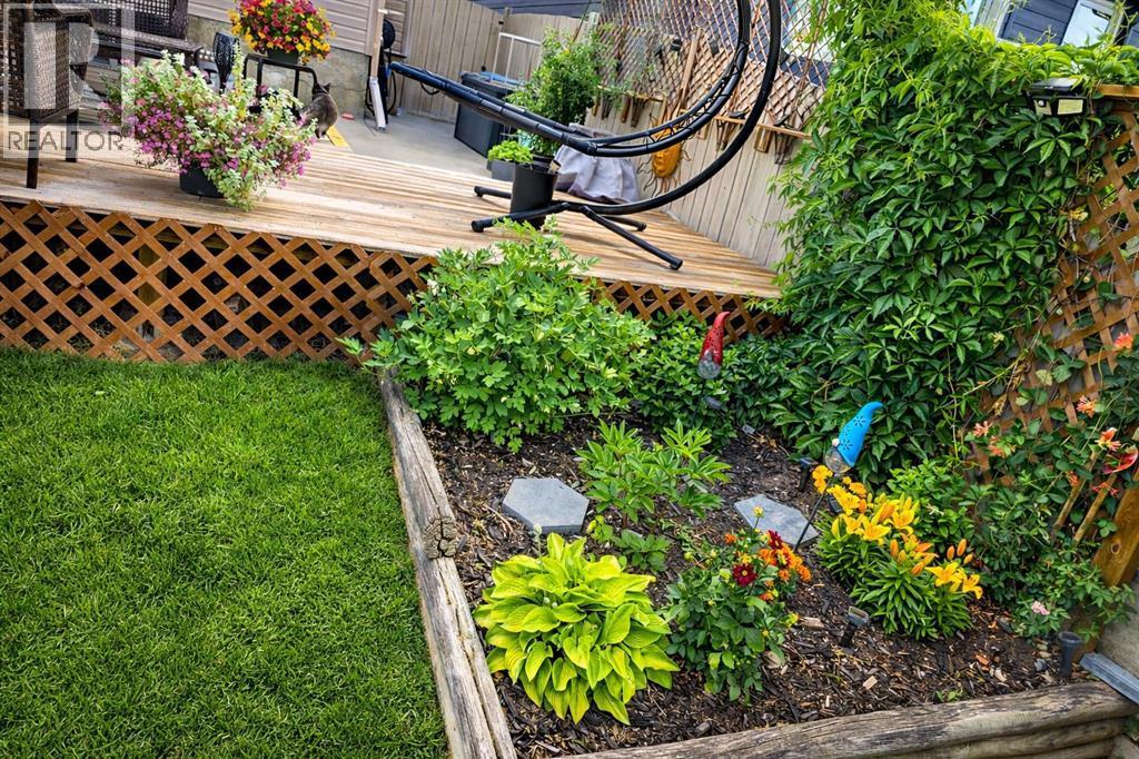 Summer pictures - 9 Hidden Valley Crescent Nw, Calgary, AB - Outdoor With Deck Patio Veranda