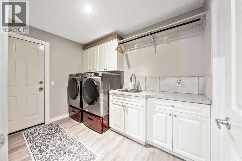 Laundry Room - 9 Hidden Valley Crescent Nw, Calgary, AB - Indoor Photo Showing Laundry Room