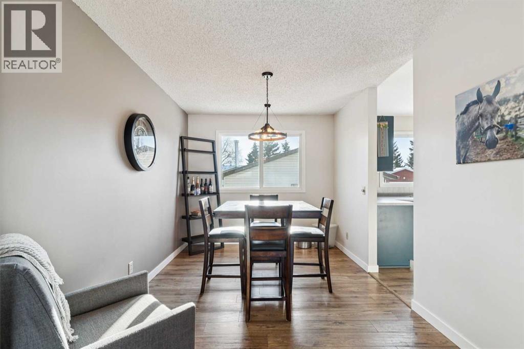 205 Acacia Drive Se, Airdrie, AB - Indoor Photo Showing Dining Room