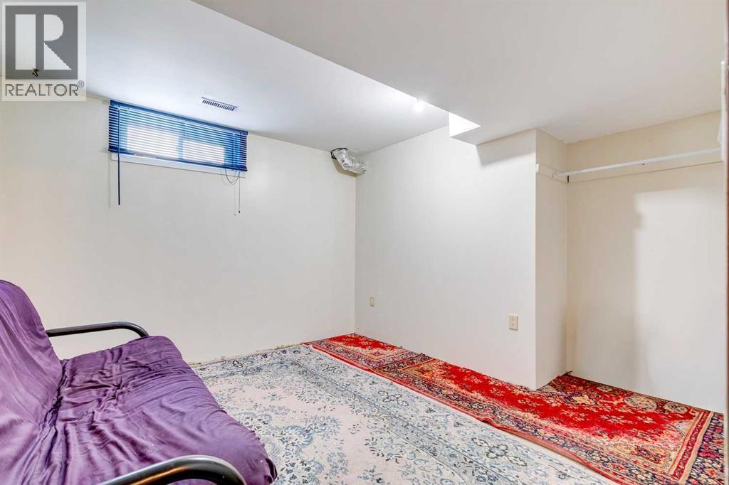 4th bedroom in basement - no egress window - 205 Acacia Drive Se, Airdrie, AB - Indoor Photo Showing Bedroom