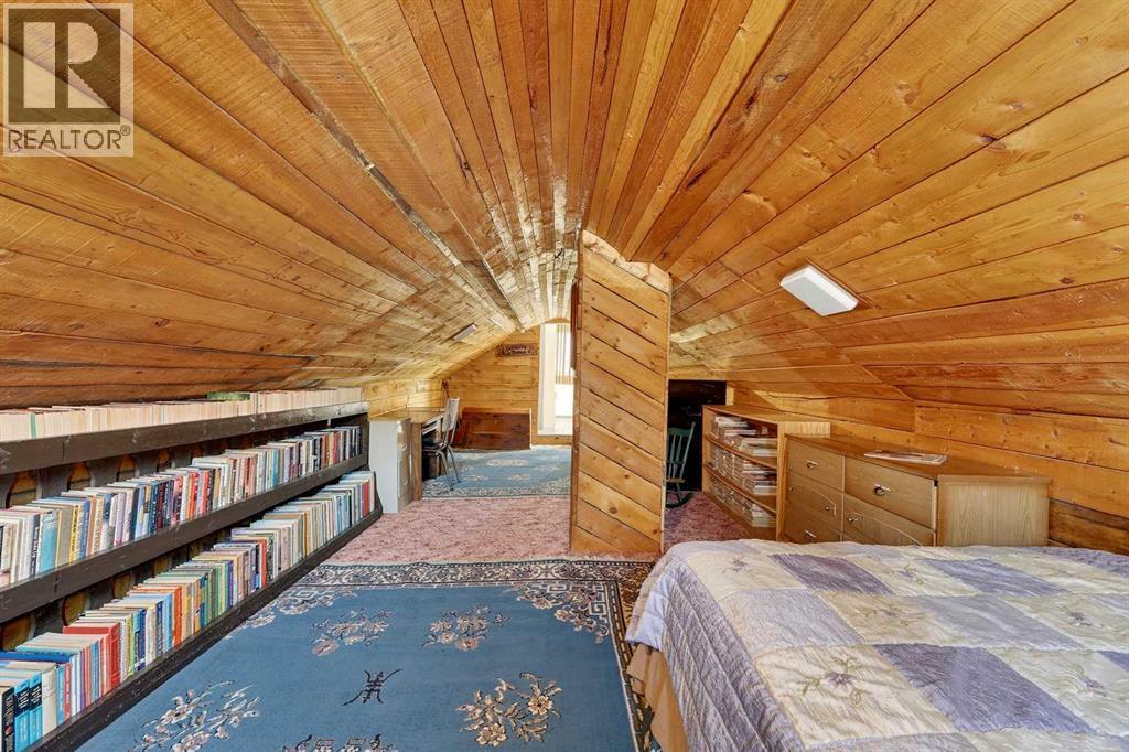 33235 Range Road 64, Rural Mountain View County, AB - Indoor Photo Showing Bedroom