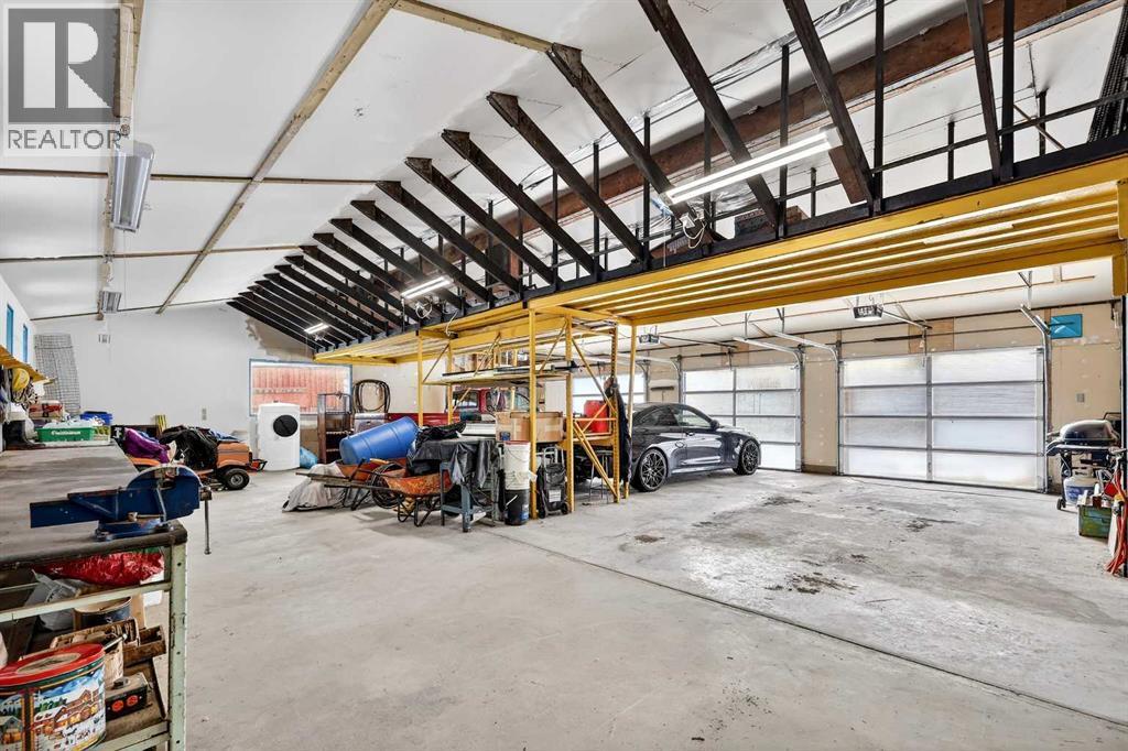 33235 Range Road 64, Rural Mountain View County, AB - Indoor Photo Showing Garage