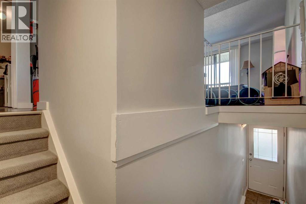 602, 2200 Woodview Drive Sw, Calgary, AB - Indoor Photo Showing Other Room