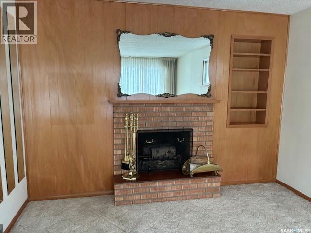 706 Balmoral Street, Saskatoon, SK - Indoor Photo Showing Other Room With Fireplace